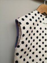 Load image into Gallery viewer, Cream with black spot quilted Kids gilet.