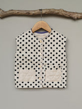 Load image into Gallery viewer, Cream with black spot quilted Kids gilet.