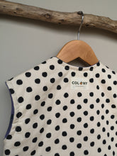 Load image into Gallery viewer, Cream with black spot quilted Kids gilet.
