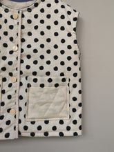 Load image into Gallery viewer, Cream with black spot quilted Kids gilet.

