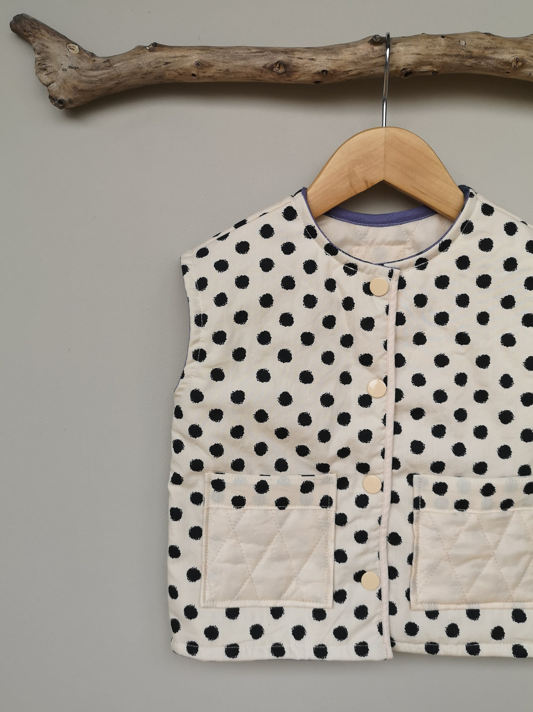 Cream with black spot quilted Kids gilet.