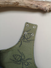 Load image into Gallery viewer, Children&#39;s denim dungarees with adjustable shoulder straps, centre front pocket and green ant print lining.
