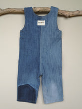 Load image into Gallery viewer, Children&#39;s denim dungarees with adjustable shoulder straps, centre front pocket and green ant print lining.
